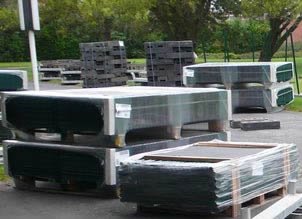Green 358 welded mesh panels with protective packing on export pallets