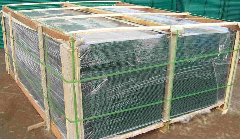 358 welded mesh security fence panels wrapped and secured on pallets for warehouse storage