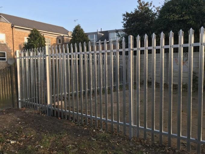 Palisade security steel fence with shaped steel pales and horizontal rails