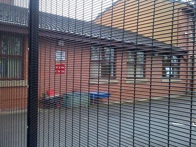 Black 358 anti-climb fence panels forming a residential security perimeter