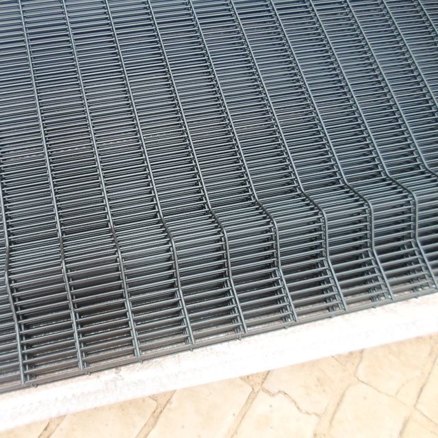 BMP 358 prison mesh security fence product showing rigid welded steel panel construction