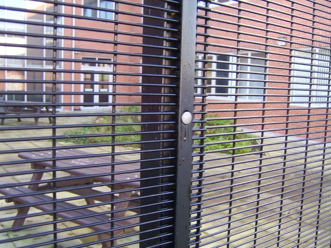 High-security prison mesh fencing system with dense welded steel wires and protective surface finish