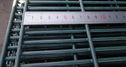 358 security mesh ruler measurement showing 76.2 mm wire spacing for ClearView fencing