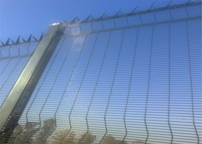 Orange and black BMP 358 security mesh fence panel photograph